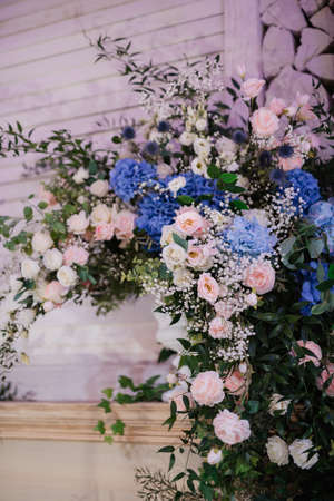 elegant wedding decorations made of natural flowers and green elementsの写真素材