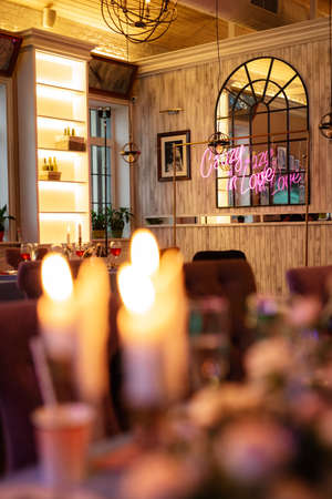 atmospheric candle decor with live fire on the banquet tableの写真素材
