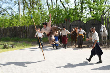 Zaporozhye Cossacks from the Zaporozhye army in national costumes on horsebackのeditorial素材