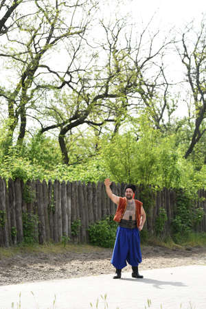 Zaporozhye Cossacks from the Zaporozhye army in national costumes on horsebackのeditorial素材