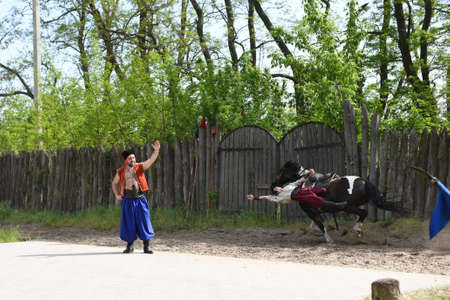 Zaporozhye Cossacks from the Zaporozhye army in national costumes on horseback