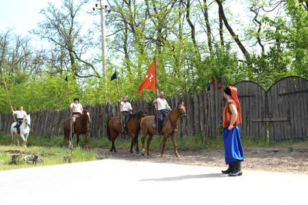 Zaporozhye Cossacks from the Zaporozhye army in national costumes on horseback