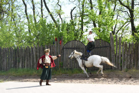 Zaporozhye Cossacks from the Zaporozhye army in national costumes on horsebackのeditorial素材