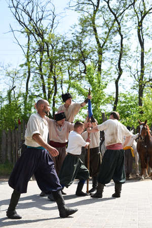 Zaporozhye Cossacks from the Zaporozhye army in national costumes on horsebackのeditorial素材
