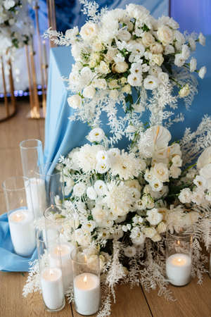 atmospheric candle decor with live fire on the banquetの写真素材