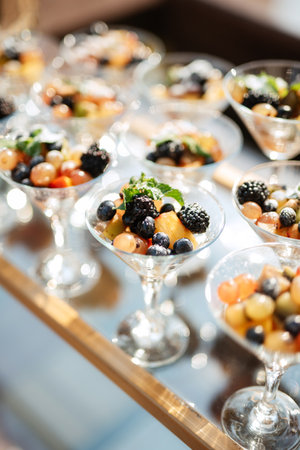 welcome buffet with alcohol and snacks, sandwiches, cupcakesの写真素材