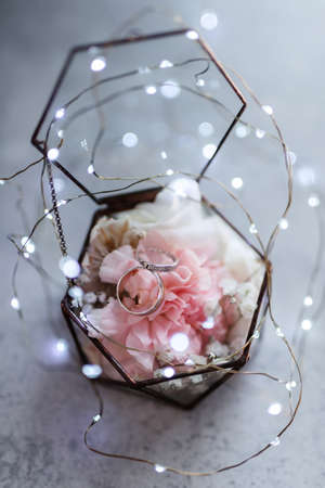 gold wedding rings with a wedding decor