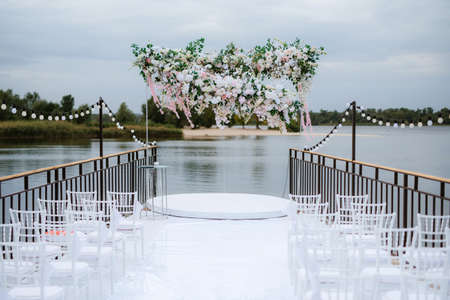 wedding ceremony area, arch chairs decorの写真素材