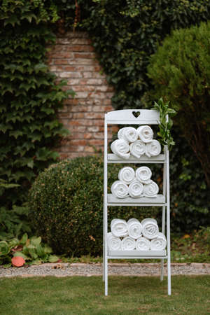 white plush blankets in wooden boxes for event inviteesの写真素材