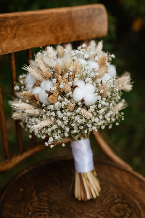elegant wedding bouquet of fresh natural flowers and greeneryの写真素材