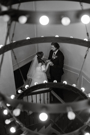 young couple bride and groom in a white dress walkingの写真素材