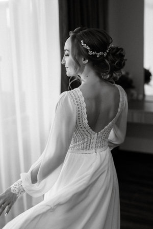 bride in a white dress at the training camp inside the hotelの写真素材