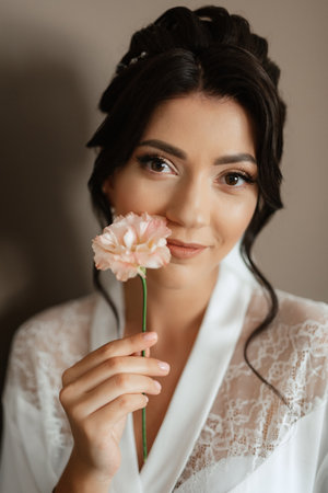 morning of the bride with the creation of the image of makeup and the creation of hairstylesの写真素材