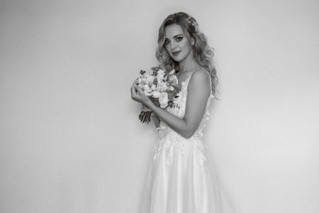 morning of the bride with the creation of the image of makeup and the creation of hairstyles