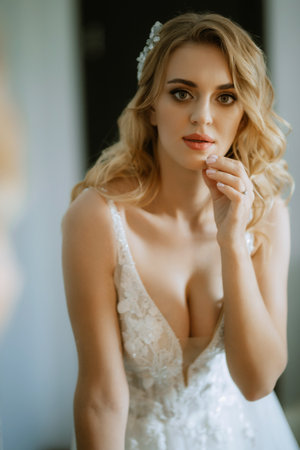 morning of the bride with the creation of the image of makeup and the creation of hairstylesの写真素材