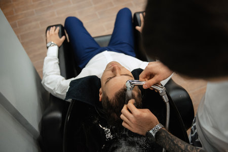 morning of the groom in the barbershopの写真素材