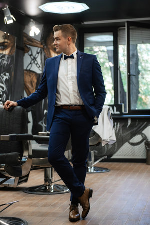 morning of the groom in the barbershopの写真素材