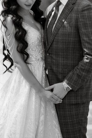 the first meeting of the bride and groom in the courtyard of a European hotelの写真素材