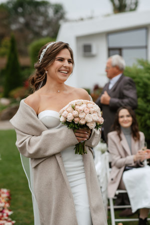 wedding ceremony of the newlyweds in a country cottage on a green hillの写真素材