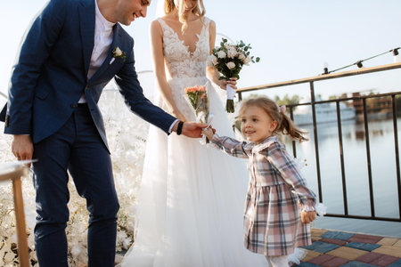 wedding ceremony of the newlyweds on the pier near the restaurantの写真素材