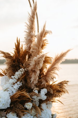 elegant wedding decorations made of natural flowers and green elementsの写真素材