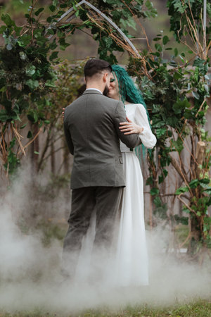 the first wedding dance of the bride and groom in the glade of the country club
