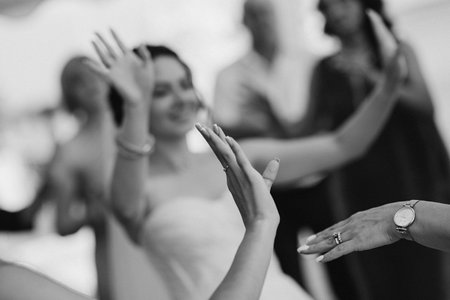the first dance of the bride and groom inside a restaurant with heavy smokeの写真素材