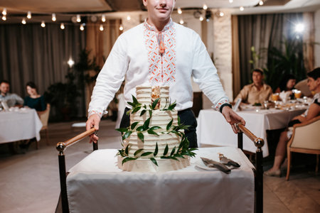 newlyweds happily cut, laugh and taste the wedding cake