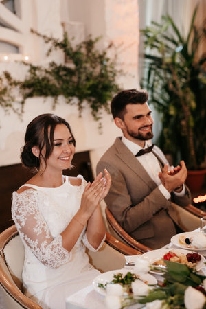 portrait of the newlyweds at the presidium at the wedding banquetの写真素材