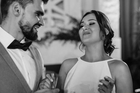 the first dance of the bride and groom inside a restaurantの写真素材