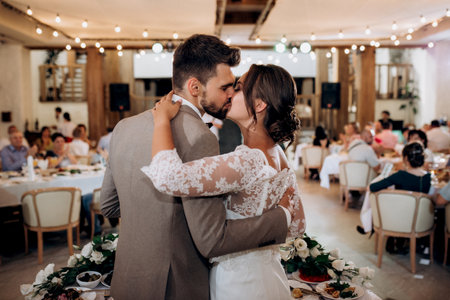 portrait of the newlyweds at the presidium at the wedding banquetの写真素材