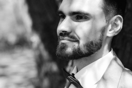 portrait of a guy in a gray three-piece suitの写真素材