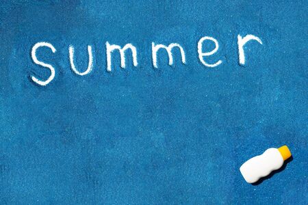 Text summer on blue small stones.の写真素材