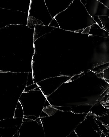 broken glass on a black background. close-up. image for design