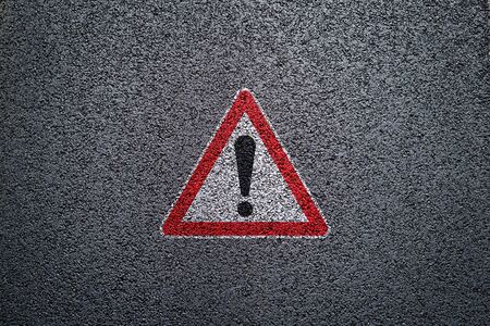 traffic and traffic signs on asphalt
