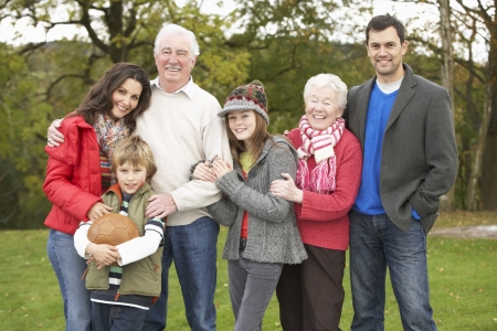 Extended Family Group On Walk Through Countryside