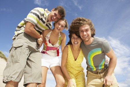 Group Of Friends Having Fun On Summer Beachの写真素材