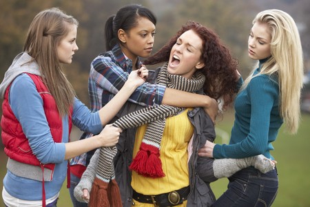 Group Of Female Teenagers Bullying Girlの写真素材