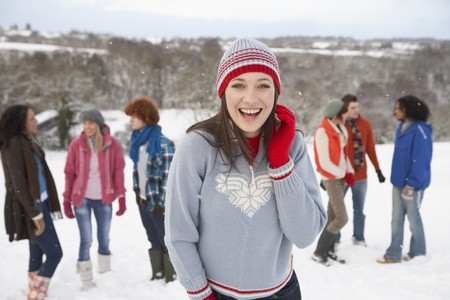 Group Of Young Friends Having Fun In Snowy Landscapeの写真素材