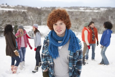 Group Of Young Friends Having Fun In Snowy Landscapeの写真素材