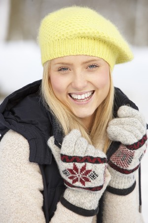 Close Up Of Teenage Girl In Snowy Landscapeの写真素材