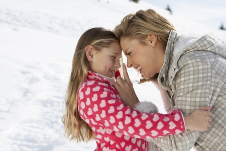 Young Mother And Daughter On Winter Vacationの写真素材