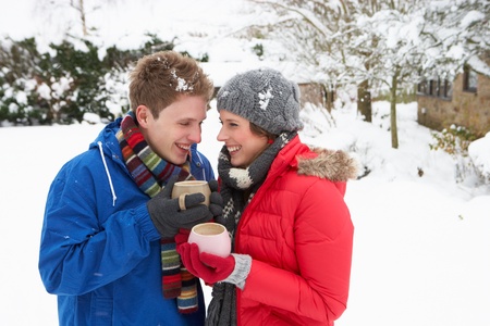 Young couple in snowの写真素材