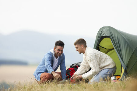 Two Young Men On Camping Trip In Countrysideの写真素材