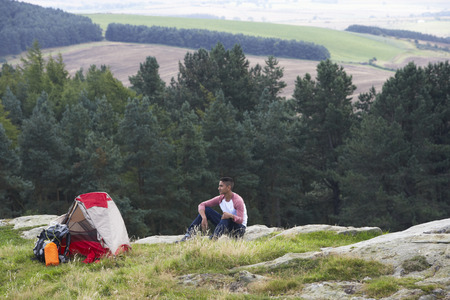Young Man On Camping Trip In Countrysideの写真素材