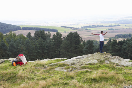 Young Man On Camping Trip In Countrysideの写真素材