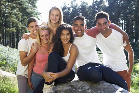 Group Of Young People Relaxing In Countrysideの写真素材