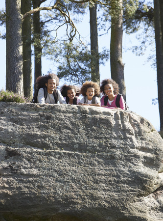 Family Resting On Hike Through Countrysideの写真素材