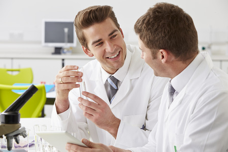Two Technicians Working In Laboratoryの写真素材