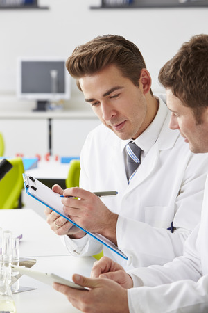 Two Technicians Working In Laboratoryの写真素材